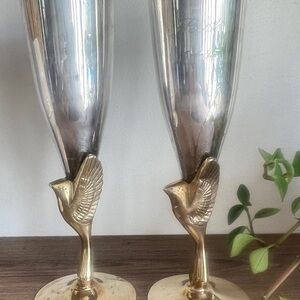 Vintage brass and silver champagne flutes with brass doves